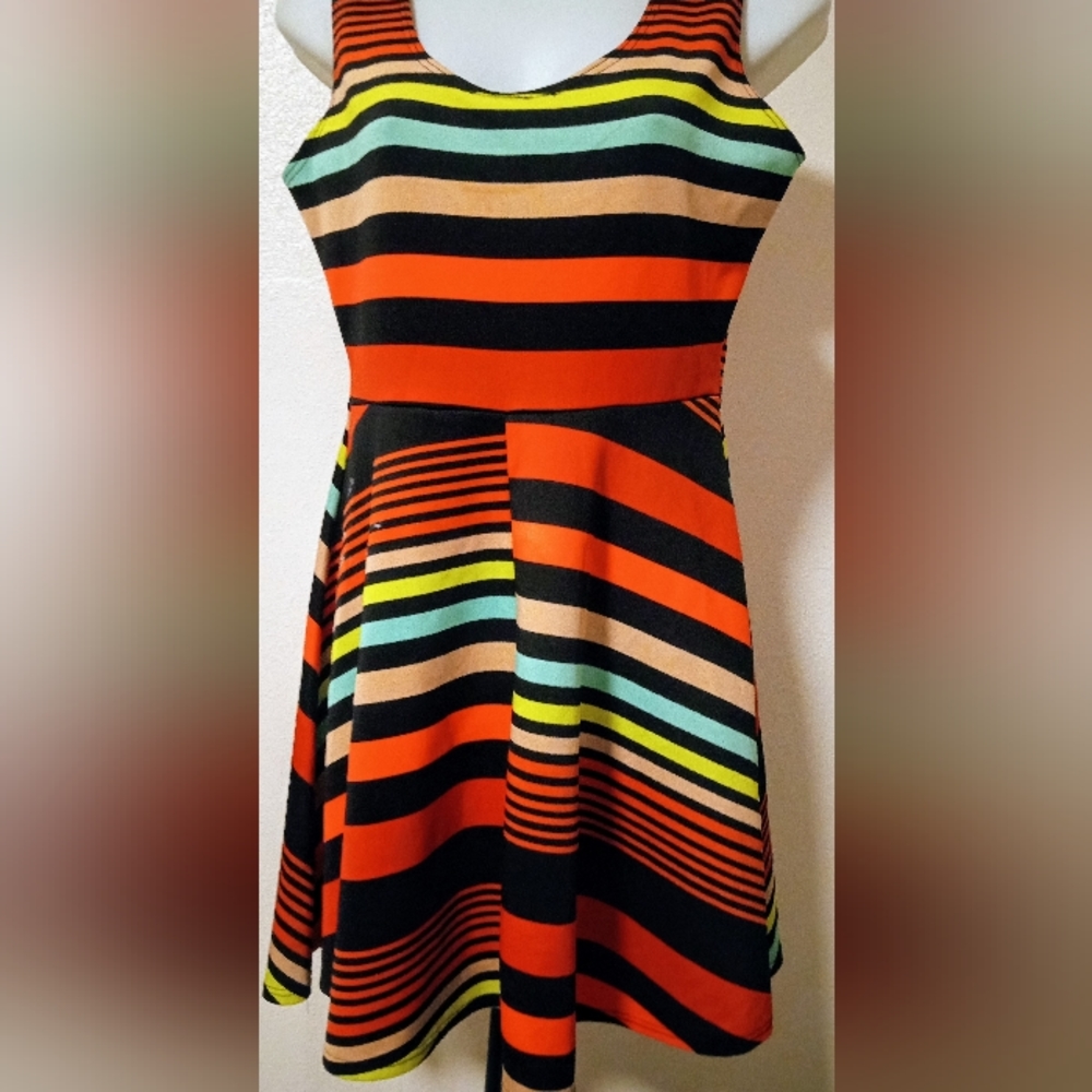 Standout in this fun and flirty dress! Date night, parties, casual events,ECT.